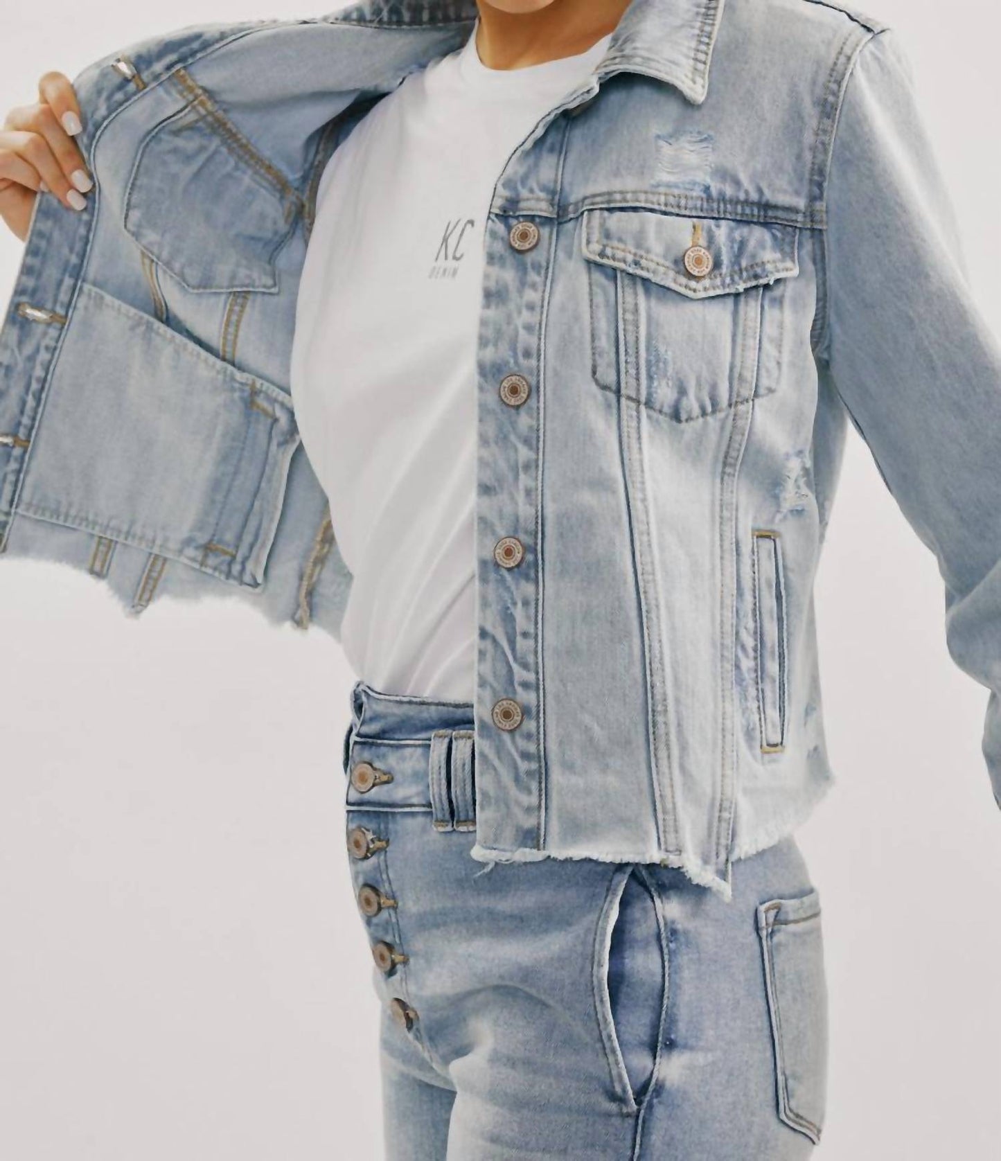 Distressed Denim Jacket In Light