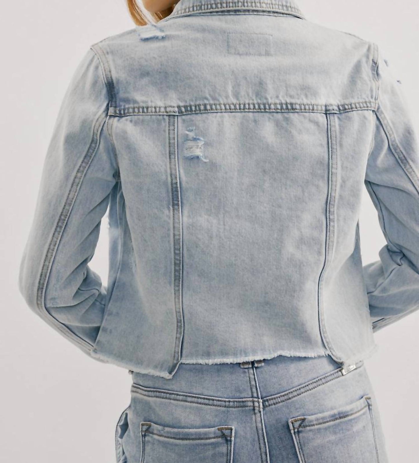 Distressed Denim Jacket In Light